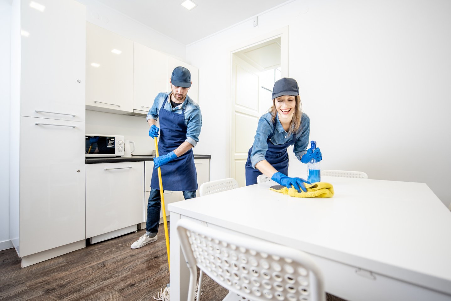 Workers Cleaning a Kitchen